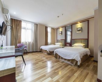 Guangzhou Yide Hotel - غوانغزهو - غرفة نوم