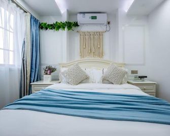 Shiguangli Boutique Stay (Changsha Wu Yi Square Ifs) - Changsha - Bedroom
