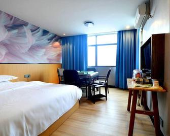 Haotian Boutique Hotel - Changsha - Schlafzimmer