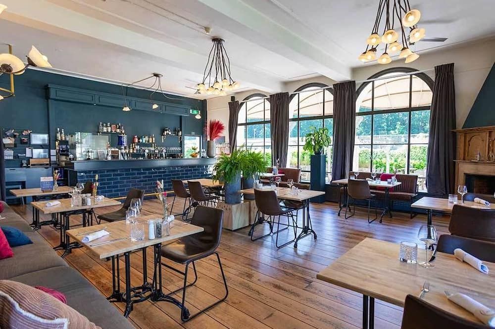 Embrace stillness in style | Rejuvenating Haven near local sights & Nature - Bosschenhoofd - Restaurace