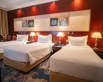 Emaar Royal Hotel - מדינה - חדר שינה