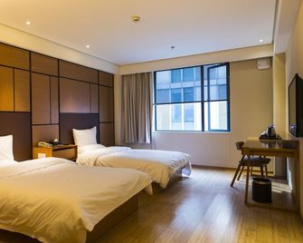 Ji Hotel Changchun Oriental Plaza - Changchun - Camera da letto