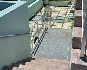 Enjoy a stylish experience at this centrally-located place. - Warwick - Stairs