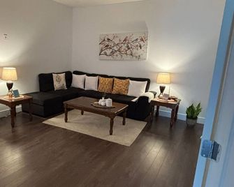 Entire Ground floor - Bed Room & Rec room in Quite & pleasant Neighborhood - Middle Sackville - Living room