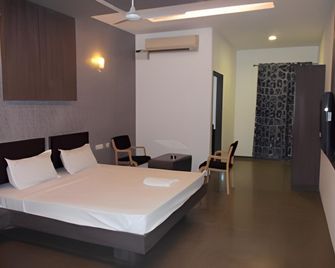 Hotel Kra - Thanjāvūr - Спальня