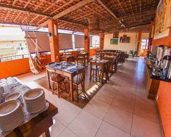 بوسادا أكونتشيجو دو بورتو - بورتو دي جاليناس - مطعم