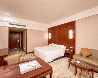 Phoenix International Hotel - Dazhou - Bedroom