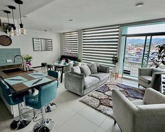 Charming 2-bedroom condo apartment with WiFi, fitness & pool in San José - San Jose - Salon