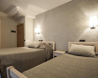 Hotel Maloia - Dubino - Schlafzimmer