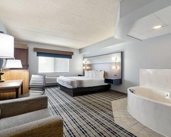 AmericInn by Wyndham Chamberlain Conference Center - Chamberlain - Schlafzimmer