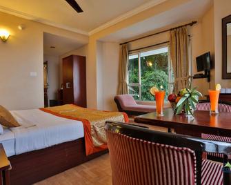 Misty Mountain Resort - Munnar - Phòng ngủ