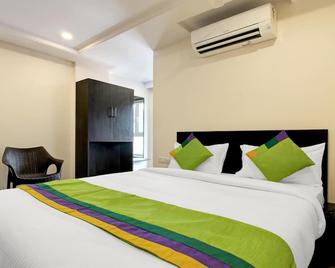Treebo Excella - Visakhapatnam - Bedroom