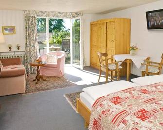 Landhotel Herzberger garni Zimmer & Ferienwohnungen - Scheidegg - Camera da letto