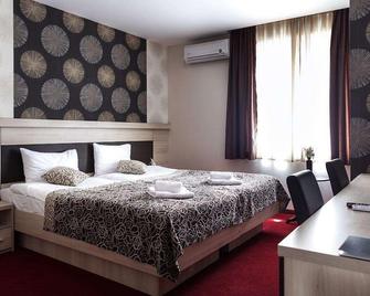 Hotel City Code Vizura Garni Renew - Belgrade - Bedroom