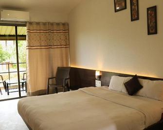 Forest Inn Mahabaleshwar - Mahabaleshwar - Schlafzimmer