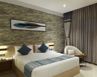 Click Hotel Bangalore - International Airport - Bengaluru - Bedroom