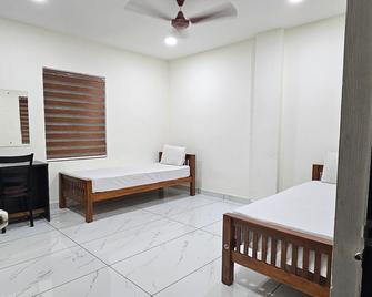 Aman Residency - Thodupuzha - Bedroom