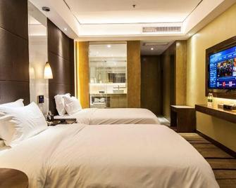 Aisi Hotel (Hanzhong Tea City) - Hanzhong - Спальня