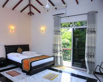 Hotel River Front - Tissamaharama - Habitación