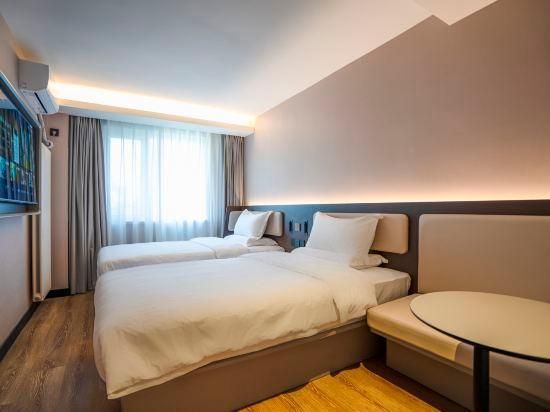 Hanting Hotel Tianjin Italian Style Street - טיאנג'ין - חדר שינה