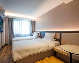 Hanting Hotel Tianjin Italian Style Street - טיאנג'ין - חדר שינה