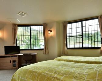 Petit Hotel Iris - Otari - Ložnice