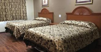 Gainesville Lodge - גיינסוויל - חדר שינה