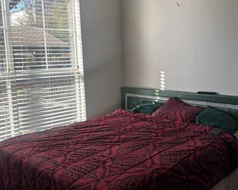 It is a shared place. I work from home, day shift. Welcome and enjoy your stay. - Irving - Bedroom