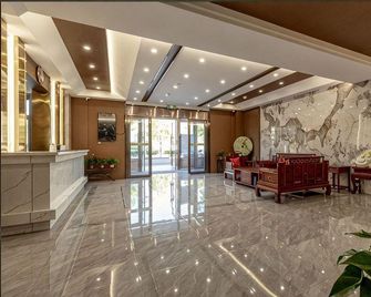 Tongjia Riverfront Hotel. - Tonghua - Lobby