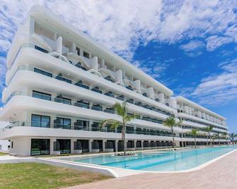 Vista Relax Golf & Pool View @ Cana Rock Star 210 - Bavaro - Building