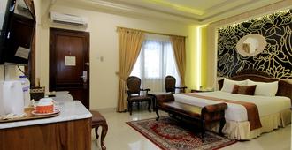 Hotel Indah Palace Yogyakarta - Yogyakarta - Bedroom