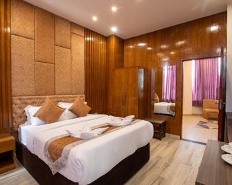 Nansc Hotel - Siddharthanagar - Bedroom