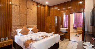 Nansc Hotel - Siddharthanagar - Bedroom