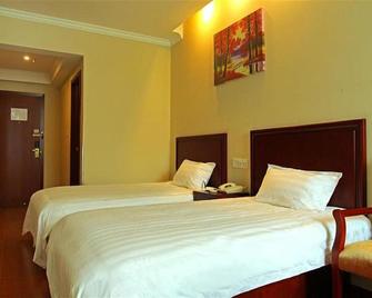 Greentree Inn Shandong Jining Jiaxiang County Jianshe (S) Road Express Hotel - Jining - Bedroom
