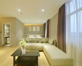 Pingding Hotel (Pingding Bus Station Branch) - Maoming - Bedroom