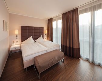 Hotel Eberhards am Wasser - Bietigheim-Bissingen - Schlafzimmer