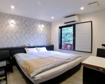 Hotel Square Numazu - Numazu - Slaapkamer