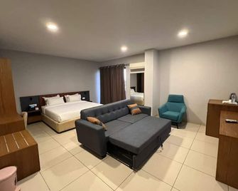 هوتل جولف كوست - كينشاسا - غرفة نوم