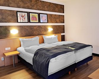 Garner Hotel Cottbus SüD By IHG - Cottbus - Bedroom