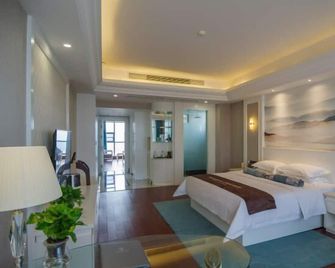 Jiu Long Ying Bin Hotel - Їбін - Спальня