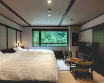 Oyado Shikishimaso - Higashikawa - Schlafzimmer