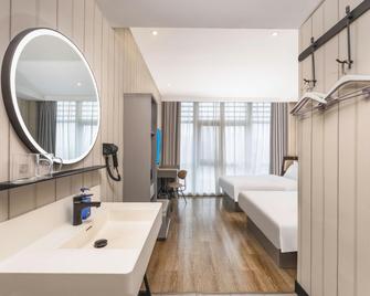 Hanting Hotel Nantong Yongxing - Nantong - Bedroom