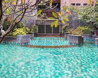 1BR Queen Bed at Marina Ancol Apartment near Dufan By Travelio - ג'קרטה - בריכה