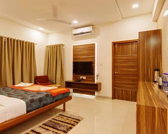 Hotel Woodland Kolhapur - Kolhāpur - Bedroom