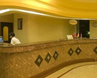 Side Palm D'or Hotel - Side - Front desk