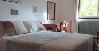 Hostal Palas - A Coruña - Schlafzimmer