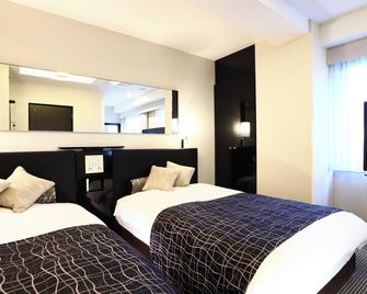 Apa Hotel Ginza Shintomicho Ekimae - Tokyo - Bedroom