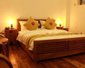 Chuxiong Courtyard China Theme Hostel - Chuxiong - Bedroom
