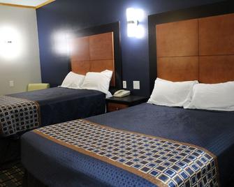 Home Gate Inn & Suites - Southaven - Bedroom