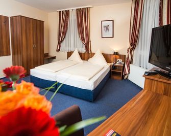 Hotel Mondial Comfort - Frankfurt City Centre - פרנקפורט אם מיין - חדר שינה